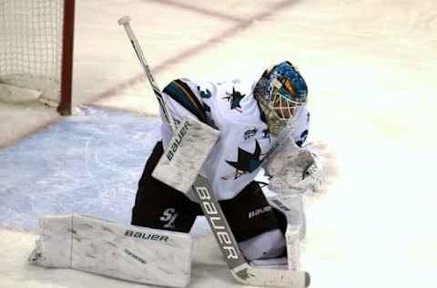 Apr 5, 2016; Saint Paul, MN, USA; San Jose Sharks goalie James Reimer (34) makes a save against the Minnesota Wild during the third period at Xcel Energy Center. The Sharks won 3-0. Mandatory Credit: Marilyn Indahl-USA TODAY Sports