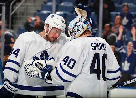 BUFFALO, NY – MARCH 20: Auston Matthews #34 and Garret Sparks #40 of the Toronto Maple Leafs celebrate a win against the Buffalo Sabres following an NHL game on March 20, 2019 at KeyBank Center in Buffalo, New York. Toronto won, 4-2. (Photo by Bill Wippert/NHLI via Getty Images)