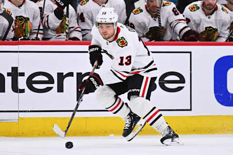 Feb 19, 2023; Chicago, Illinois, USA; Chicago Blackhawks forward Max Domi (13) skates against the Toronto Maple Leafs at United Center. Mandatory Credit: Jamie Sabau-USA TODAY Sports