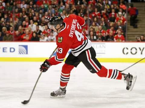 Nov 12, 2015; Chicago, IL, USA; Chicago Blackhawks defenseman Viktor Svedberg (43) tries to score against the New Jersey Devils during the first period at United Center. Mandatory Credit: Kamil Krzaczynski-USA TODAY Sports