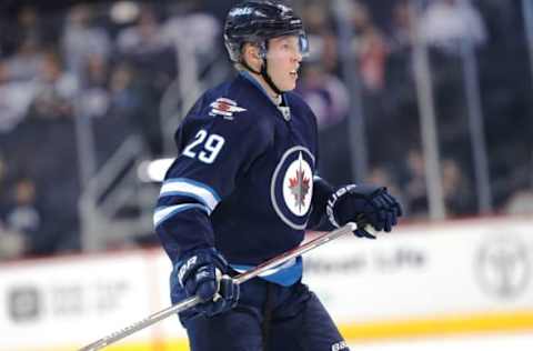 Oct 17, 2016; Winnipeg, Manitoba, CAN; Winnipeg Jets right wing Patrik Laine (29) watches the play during the third period against the Boston Bruins at the MTS Centre. Boston won 4-1. Mandatory Credit: Bruce Fedyck-USA TODAY Sports