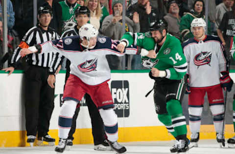 DALLAS, TX – NOVEMBER 12: Jamie Benn #14 of the Dallas Stars gets physical against Josh Anderson #77 of the Columbus Blue Jackets at the American Airlines Center on November 12, 2018 in Dallas, Texas. (Photo by Glenn James/NHLI via Getty Images)