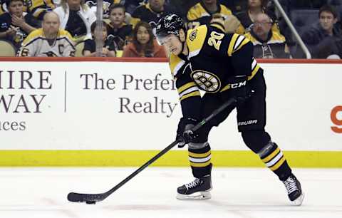 Apr 21, 2022; Pittsburgh, Pennsylvania, USA; Boston Bruins center Curtis Lazar (20) skates with the puck against the Pittsburgh Penguins during the third period at PPG Paints Arena. Mandatory Credit: Charles LeClaire-USA TODAY Sports