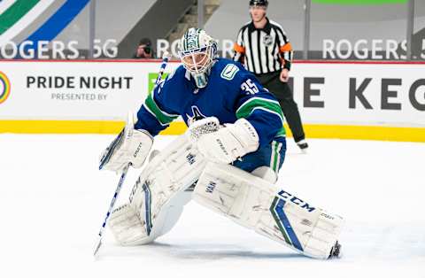 VANCOUVER, BC – MARCH 22: Goalie Thatcher Demko #35 of the Vancouver Canucks readies to make a save during NHL action against the Winnipeg Jets at Rogers Arena on March 22, 2021 in Vancouver, Canada. (Photo by Rich Lam/Getty Images)