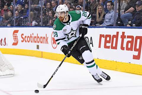 TORONTO, ON – MARCH 14: Dallas Stars Defenceman Stephen Johns (28) moves the puck from behind the net during the regular season NHL game between the Dallas Stars and Toronto Maple Leafs on March 14, 2018 at Air Canada Centre in Toronto, ON. (Photo by Gerry Angus/Icon Sportswire via Getty Images)