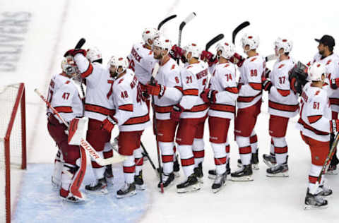 TORONTO, ONTARIO – AUGUST 04: James Reimer #47 of the Carolina Hurricanes celebrates with his teammates after defeating the New York Rangers in Game Three of the Eastern Conference Qualification Round prior to the 2020 NHL Stanley Cup Playoffs at Scotiabank Arena on August 04, 2020, in Toronto, Ontario, Canada. (Photo by Andre Ringuette/Freestyle Photo/Getty Images)