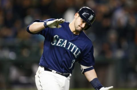 Sep 29, 2016; Seattle, WA, USA; Seattle Mariners catcher Mike Zunino (3) celebrates as he runs the bases after hitting a solo-home run against the Oakland Athletics during the seventh inning at Safeco Field. Mandatory Credit: Joe Nicholson-USA TODAY Sports