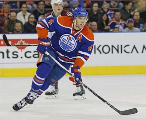 Feb 20, 2016; Edmonton, Alberta, CAN; Edmonton Oilers forward Taylor Hall (4) looks for a pass during the first period against the Colorado Avalanche at Rexall Place. Mandatory Credit: Perry Nelson-USA TODAY Sports