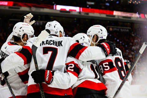 RALEIGH, NC – APRIL 04: Brady Tkachuk #7 of the Ottawa Senators celebrates his goal with teammates during the third period the game against the Carolina Hurricanes at PNC Arena on April 04, 2023 in Raleigh, North Carolina. Hurricanes defeat Senators 3-2. (Photo by Jaylynn Nash/Getty Images)