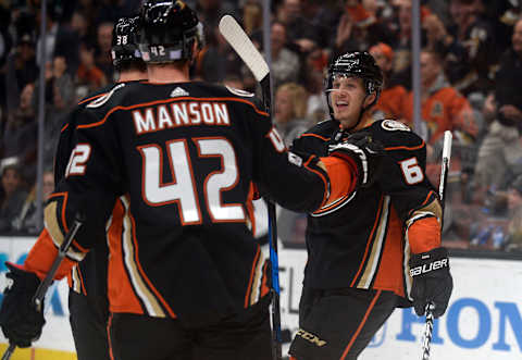 Anaheim Ducks center Rickard Rakell (67) celebrates with center Derek Grant (38) and defenseman Josh Manson (42) Mandatory Credit: Gary A. Vasquez-USA TODAY Sports