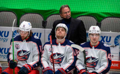 Mar 6, 2021; Dallas, Texas, USA; Columbus Blue Jackets head coach John Tortorella argues a call during the second period against the Dallas Stars at the American Airlines Center. Mandatory Credit: Jerome Miron-USA TODAY Sports