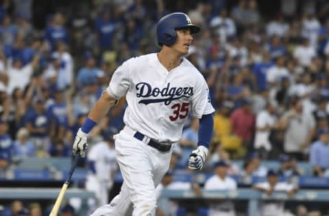 Jun 19, 2017; Los Angeles, CA, USA; Los Angeles Dodgers first baseman Cody Bellinger (35) hits a solo home run against the New York Mets during the second inning at Dodger Stadium. Mandatory Credit: Richard Mackson-USA TODAY Sports