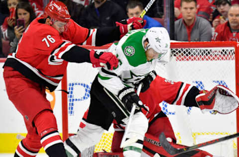 RALEIGH, NORTH CAROLINA – FEBRUARY 25: Brady Skjei #76 of the Carolina Hurricanes defends against Joe Pavelski #16 of the Dallas Stars during the second period at PNC Arena on February 25, 2020 in Raleigh, North Carolina. (Photo by Grant Halverson/Getty Images)