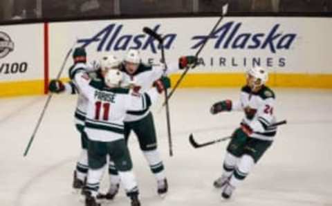 Jan 5, 2017; San Jose, CA, USA; Minnesota Wild players celebrate a scored goal against the San Jose Sharks during the third period of the game at SAP Center at San Jose. The Minnesota Wild defeated the San Jose Sharks with a score of 5-4. Mandatory Credit: Stan Szeto-USA TODAY Sports