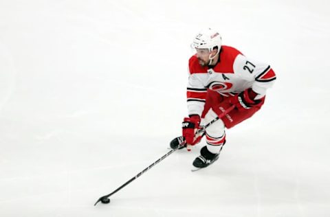 BOSTON, MASSACHUSETTS – MAY 09: Justin Faulk #27 of the Carolina Hurricanes skates during the first period against the Boston Bruins in Game One of the Eastern Conference Final during the 2019 NHL Stanley Cup Playoffs at TD Garden on May 09, 2019 in Boston, Massachusetts. (Photo by Adam Glanzman/Getty Images)