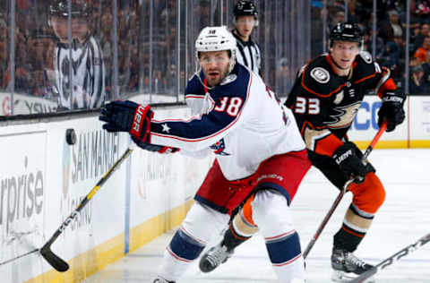 ANAHEIM, CA – NOVEMBER 4: Boone Jenner #38 of the Columbus Blue Jackets reaches for the puck as Jakob Silfverberg #33 of the Anaheim Ducks looks on during the third period of the game at Honda Center on November 4, 2018, in Anaheim, California. (Photo by Debora Robinson/NHLI via Getty Images)