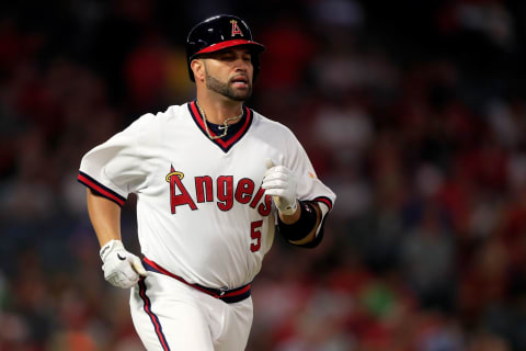 ANAHEIM, CA – AUGUST 27: Allbert Pujols #5 of the Los Angeles Angels of Anaheim looks on after flying out during the second inning of a game against the Colorado Rockies at Angel Stadium on August 27, 2018 in Anaheim, California. (Photo by Seean M. Haffey/Getty Images)