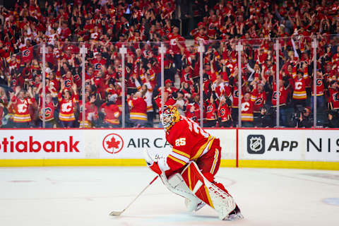 May 15, 2022; Calgary, Alberta, CAN; Calgary Flames goaltender Jacob Markstrom (25) celebrates win over the Dallas Stars in game seven of the first round of the 2022 Stanley Cup Playoffs at Scotiabank Saddledome. Mandatory Credit: Sergei Belski-USA TODAY Sports