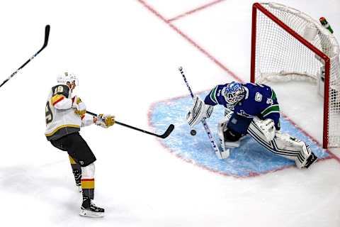 Reilly Smith #19 of the Vegas Golden Knights attempts a shot on Thatcher Demko #35 of the Vancouver Canucks during the first period in Game Six of the Western Conference Second Round. (Photo by Bruce Bennett/Getty Images)