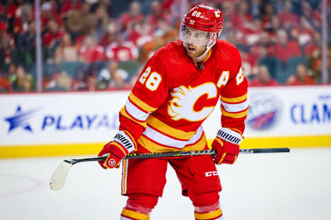 Oct 13, 2022; Calgary, Alberta, CAN; Calgary Flames center Elias Lindholm (28) during the face off against the Colorado Avalanche during the second period at Scotiabank Saddledome. Mandatory Credit: Sergei Belski-USA TODAY Sports