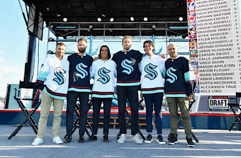 SEATTLE, WASHINGTON – JULY 21: The Seattle Kracken draft picks (L-R) Jordan Eberle, Chris Driedger, Chris Tanev, Jamie Oleksiak, Haydn Fleury and Mark Giordano following the 2021 NHL Expansion Draft at Gas Works Park on July 21, 2021 in Seattle, Washington. The Seattle Kraken is the National Hockey League’s newest franchise and will begin play in October 2021. (Photo by Alika Jenner/Getty Images)