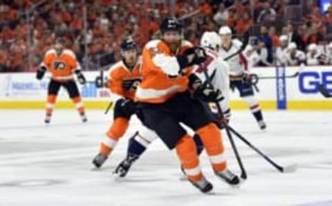 Apr 24, 2016; Philadelphia, PA, USA; Philadelphia Flyers left wing Jakub Voracek (93) chases a loose puck during the second period against the Washington Capitals in game six of the first round of the 2016 Stanley Cup Playoffs at Wells Fargo Center. Mandatory Credit: Derik Hamilton-USA TODAY Sports