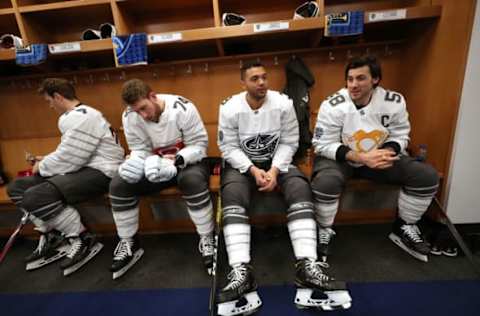 ST LOUIS, MISSOURI – JANUARY 25: (L-R) John Carlson #74 of the Washington Capitals, Jaccob Slavin #74 of the Carolina Hurricanes, Seth Jones #3 of the Columbus Blue Jackets and Kris Letang #58 of the Pittsburgh Penguins wait in the locker room prior to the 2020 NHL All-Star Game at the Enterprise Center on January 25, 2020 in St Louis, Missouri. (Photo by Chase Agnello-Dean/NHLI via Getty Images)