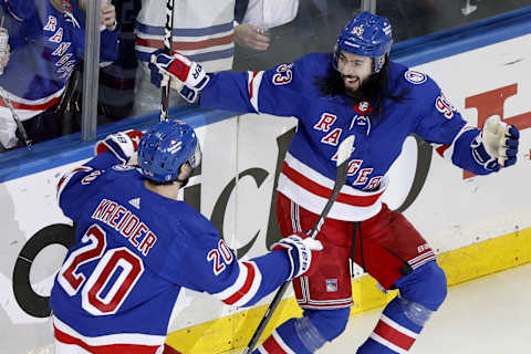 NEW YORK, NEW YORK – JUNE 01: Chris Kreider #20 of the New York Rangers celebrates with his teammate Mika Zibanejad #93 after scoring a goal on Andrei Vasilevskiy #88 of the Tampa Bay Lightning during the first period in Game One of the Eastern Conference Final of the 2022 Stanley Cup Playoffs at Madison Square Garden on June 01, 2022, in New York City. (Photo by Sarah Stier/Getty Images)