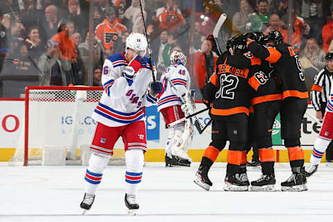 PHILADELPHIA, PA – FEBRUARY 28: Ryan Strome #16 of the New York Rangers skates back to the bench as Nicolas Aube-Kubel #62, James van Riemsdyk #25, and Philippe Myers #5 of the Philadelphia Flyers celebrate a goal by James van Riemsdyk in the second period at the Wells Fargo Center on February 28, 2020 in Philadelphia, Pennsylvania. (Photo by Mitchell Leff/Getty Images)