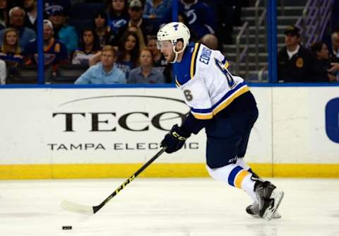 Feb 14, 2016; Tampa, FL, USA; St. Louis Blues defenseman Joel Edmundson (6) skates with the puck against the Tampa Bay Lightning during the second period at Amalie Arena. Mandatory Credit: Kim Klement-USA TODAY Sports