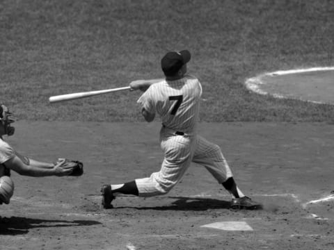 NEW YORK – 1956: Outfielder Mickey Mantle #7, of the New York Yankees, swings at a pitch during a game in 1956 against the Chicago White Sox at Yankee Stadium in New York, New York. Mickey Mantle5651 (Photo by: Kidwiler Collection/Diamond Images/Getty Images)