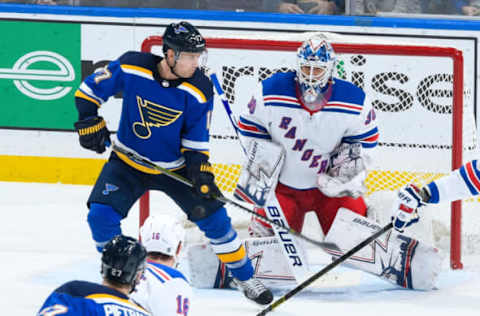 ST. LOUIS, MO – DECEMBER 31: Jaden Schwartz #17 of the St. Louis Blues attempts to screen Henrik Lundqvist #30 of the New York Rangers at Enterprise Center on December 31, 2018 in St. Louis, Missouri. (Photo by Scott Rovak/NHLI via Getty Images)