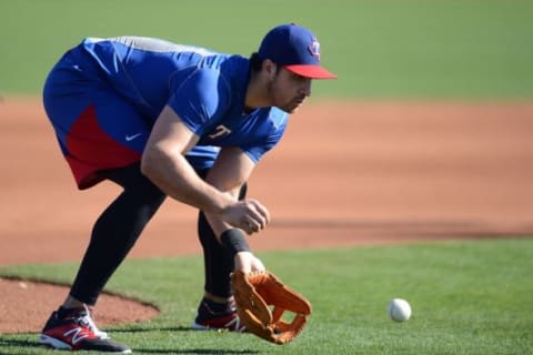 Feb 21, 2016; Surprise, AZ, USA; Texas Rangers third baseman Joey Gallo (13) fields a ground ball during a workout at Surprise Stadium Practice Fields. Mandatory Credit: Joe Camporeale-USA TODAY Sports