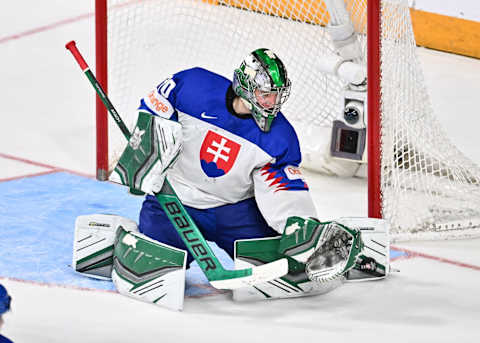 HALIFAX, CANADA – JANUARY 02: Goaltender Adam Gajan #30 of Team Slovakia makes a pad save against Team Canada during overtime in the quarterfinals of the 2023 IIHF World Junior Championship at Scotiabank Centre on January 2, 2023 in Halifax, Nova Scotia, Canada. Team Canada defeated Team Slovakia 4-3 in overtime. (Photo by Minas Panagiotakis/Getty Images)