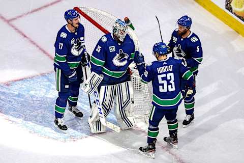 EDMONTON, ALBERTA – SEPTEMBER 03: Thatcher Demko #35 of the Vancouver Canucks is congratulated by his teammates after his 4-0 shutout victory against the Vegas Golden Knights in Game Six of the Western Conference Second Round during the 2020 NHL Stanley Cup Playoffs at Rogers Place on September 03, 2020 in Edmonton, Alberta, Canada. (Photo by Bruce Bennett/Getty Images)