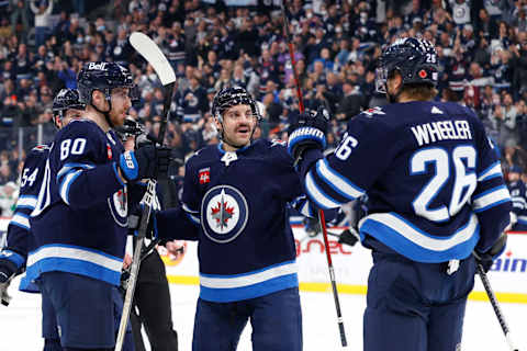 Winnipeg Jets, Dylan DeMelo (2), Blake Wheeler (26), Pierre-Luc Dubois (80). Mandatory Credit: James Carey Lauder-USA TODAY Sports