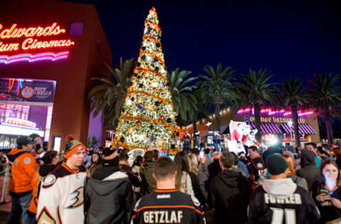 IRVINE, CA – NOVEMBER 25: Ducks fans gather around a 35-foot Christmas tree during the Duck the Halls: Watch Party at the Edwards Theater Courtyard at The Market Place in Irvine.///ADDITIONAL INFORMATION: i.1125.ducks lighting? ê 11/25/15 ?ê LEONARD ORTIZ, ORANGE COUNTY REGISTER – 10. Slug goes here.lo.jpg – “Duck the Halls” tree lighting, followed by an Anaheim Ducks watch party, is 5-9 p.m. Wednesday in the Edwards Theater courtyard at the Irvine Market Place center. Three 35-foot trees, inspired by the hockey team, will be lit before the 6 p.m. game. The MC/hosts will be former Ducks? goalie Guy Hebert (Photo by Leonard Ortiz/Digital First Media/Orange County Register via Getty Images)