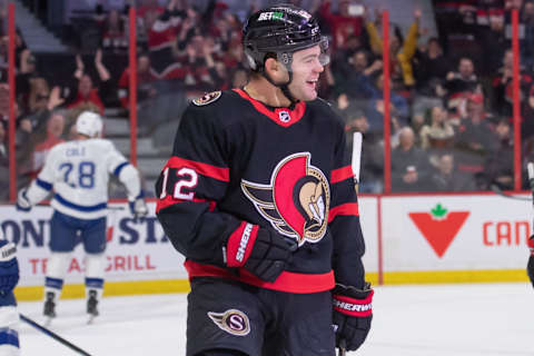 Mar 23, 2023; Ottawa, Ontario, CAN; Ottawa Senators right wing Alex DeBrincat (12) celebrates his goal scored in the first period against the Tampa Bay Lightning at the Canadian Tire Centre. Mandatory Credit: Marc DesRosiers-USA TODAY Sports