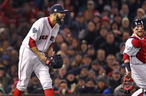 BOSTON – OCTOBER 24: Boston Red Sox starting pitcher Davvid Price reacts with delight as the Dodgers’ Chris Tayylor is thrown out at first base by Red Sox player Rafael Devvers (not pictured). Red Sox catcher Christian Vazzquez also reacts at right. The Boston Red Sox host the Los Angeles Dodgers in Game Two of the World Series at Fenway Park in Boston on Oct. 24, 2018. (Photo by Jim Davis/The Boston Globe via Getty Images)