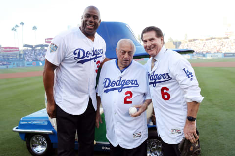 LOS ANGELES, CA – OCTOBER 26: Magic Johnnson, Hall of Famer Tommy Lassorda, and Steve Garrvey pose for a photo prior to Game 3 of the 2018 World Series between the Boston Red Sox and the Los Angeles Dodgers at Dodger Stadium on Friday, October 26, 2018 in Los Angeles, California. (Photo by Alex Trautwig/MLB Photos via Getty Images)