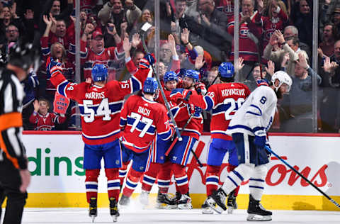 MONTREAL, CANADA - OCTOBER 12: Sean Monahan #91 of the Montreal Canadiens is joined by teammates Josh Anderson #17, Johnathan Kovacevic #26, Kirby Dach #77 and Jordan Harris #54 after scoring a goal against the Toronto Maple Leafs during the third period at Centre Bell on October 12, 2022 in Montreal, Quebec, Canada. The Montreal Canadiens defeated the Toronto Maple Leafs 4-3. (Photo by Minas Panagiotakis/Getty Images)