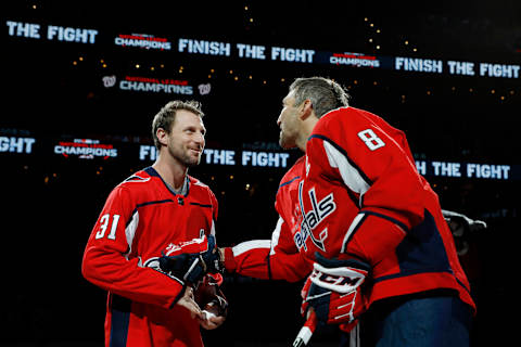 WASHINGTON, DC – OCTOBER 18: MLB player Max Scherzer of the Washington Nationals talks with Alex Ovechkin #8 of the Washington Capitals after taking part in a ceremonial puck drop before a game between the New York Rangers and Capitals at Capital One Arena on October 18, 2019 in Washington, DC. (Photo by Patrick McDermott/NHLI via Getty Images)