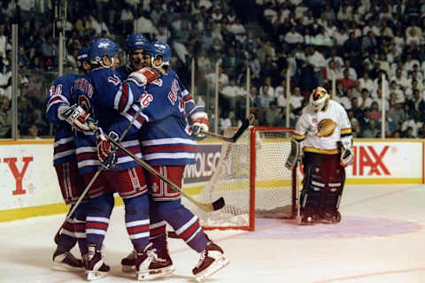 The New York Rangers celebrate: (Mike Powell /Allsport)