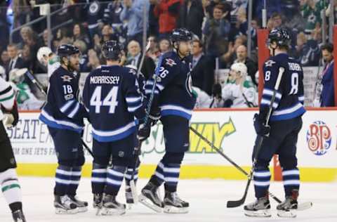 NHL Power Rankings: Winnipeg Jets right wing Patrik Laine (29) celebrates with teammates after scoring a goal during the third period against the Dallas Stars at the MTS Centre. Winnipeg wins 5-2. Mandatory Credit: Bruce Fedyck-USA TODAY Sports