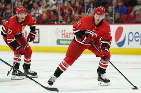 RALEIGH, NC – OCTOBER 29: Carolina Hurricanes Center Lucas Wallmark (71) skates with the puck during a game between the Calgary Flames and the Carolina Hurricanes at the PNC Arena in Raleigh, NC on October 29, 2019. (Photo by Greg Thompson/Icon Sportswire via Getty Images)