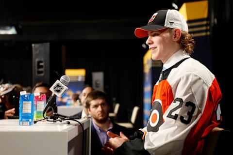 Oliver Bonk in a scrum after being drafted by the Philadelphia Flyers in the 2023 NHL Draft. (Photo by Jason Kempin/Getty Images)