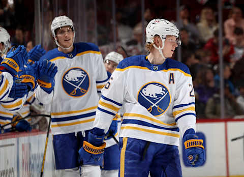 NEWARK, NEW JERSEY – APRIL 21: Rasmus Dahlin #26 of the Buffalo Sabres skates past the bench after he scored a goal during the second period against the New Jersey Devils at Prudential Center on April 21, 2022 in Newark, New Jersey. (Photo by Elsa/Getty Images)