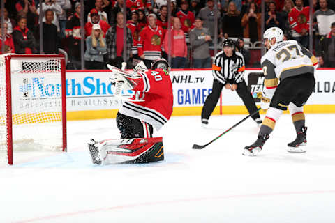 CHICAGO, IL – OCTOBER 22: Shea Theodore #27 of the Vegas Golden Knights scores on goalie Robin Lehner #40 of the Chicago Blackhawks in the shoot-out at the United Center on October 22, 2019 in Chicago, Illinois. (Photo by Chase Agnello-Dean/NHLI via Getty Images)