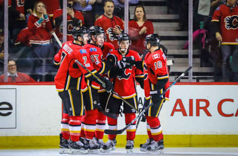 Feb 1, 2017; Calgary, Alberta, CAN; Calgary Flames center Sean Monahan (23) celebrates with teammates after scoring a goal against the Minnesota Wild during the first period at Scotiabank Saddledome. Mandatory Credit: Sergei Belski-USA TODAY Sports