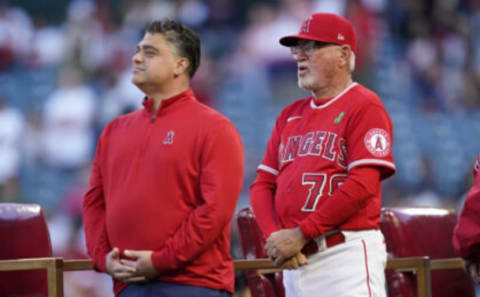 Perry Minasian with former manager Joe Maddon. Kirby Lee-USA TODAY Sports